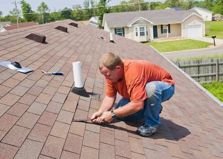 An expert perform roof maintenance services on a San Marino, CA home.